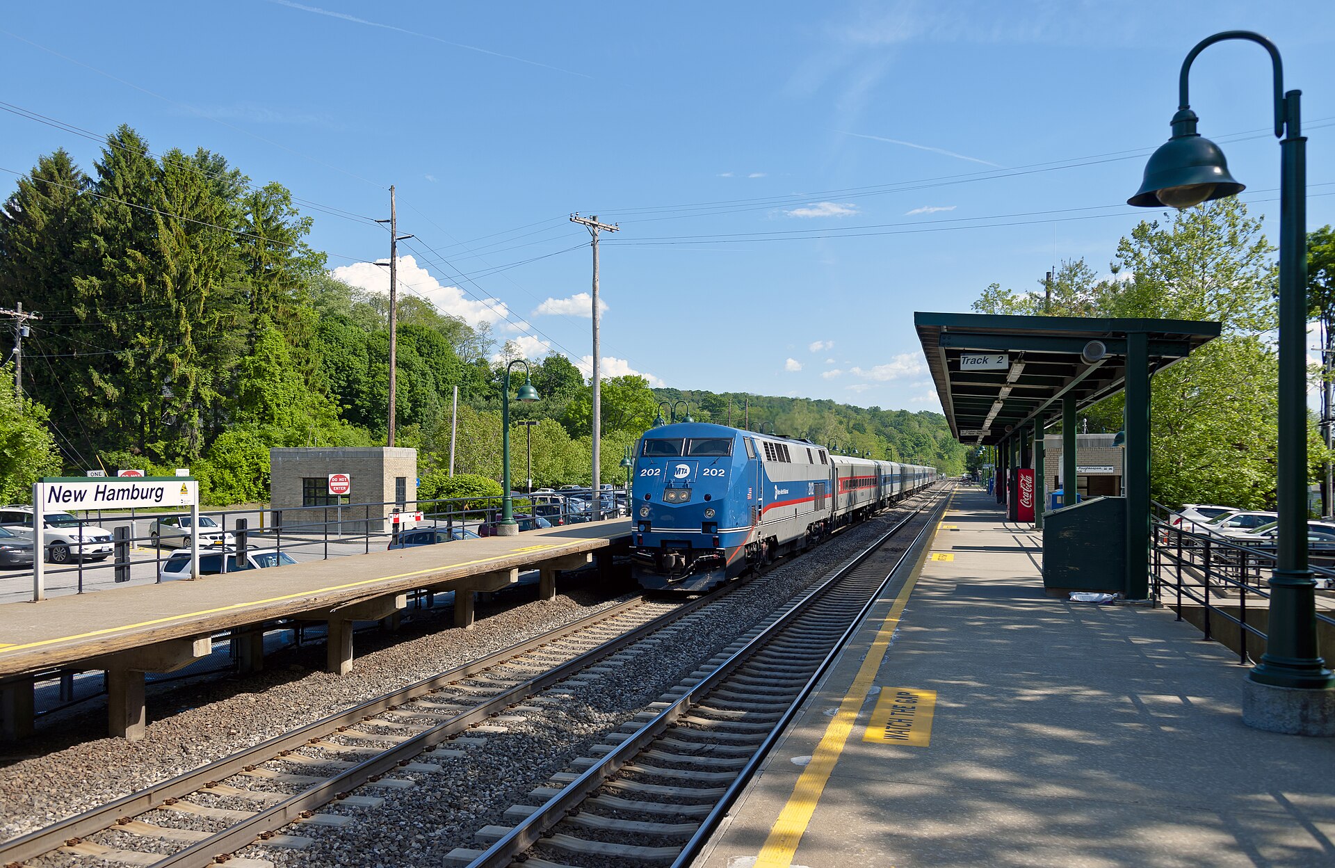 Metro-North train headed for Poughkeepsie stops at New Hamburg on a holiday weekend afternoon.